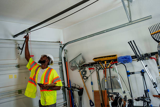 Professional Garage Door Panel Replacement technician working in Blossburg, PA